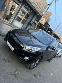 توكسان 2014  ماشي 136الف كيلو متر  ضررها تعديل بارد جاملغ سائق وسكن وص...