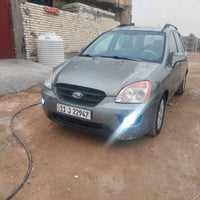 كيا راندو موديل 2010 وارد امريكي 7 راكب بلادي  ضررها باب وجاملغ بدون د...