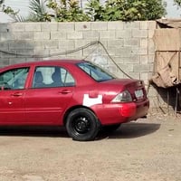 لانسر ٢٠٠٩ • مصبوغه • بعقوبه