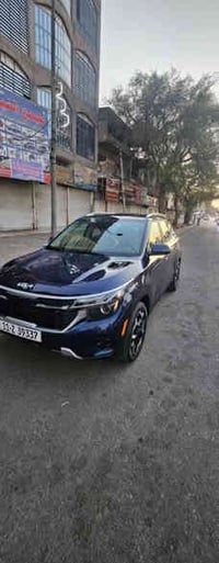 كيا سيلتوس2024  EX  حادثهة كما موضح بالصور تبديل باب خلفي يسار وتصليح ...