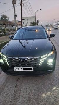 هونداي توسان هايبرد للبيع موديل 23  كير بيانو لون اسود  داخل جلد  تبري...