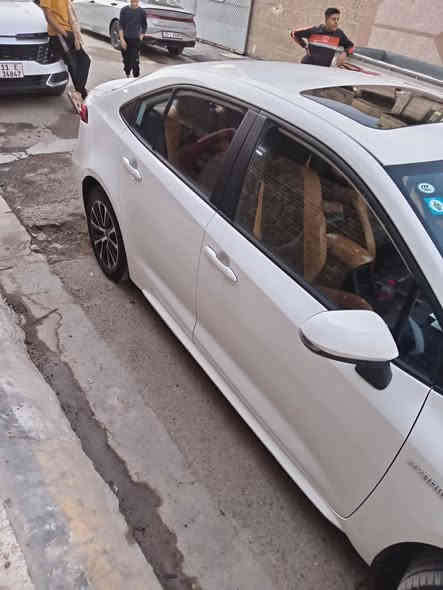 كورله هايبرد 2024 ماشيه 23 مكفوله بس مكانات بارد ***********  بغداد سعر 145
