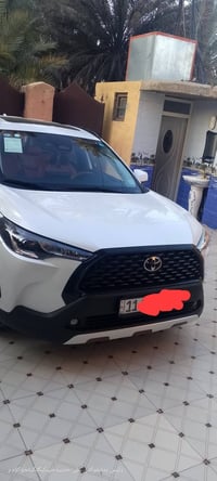 كورلا گروز  هايبرد وبانزين 2025 مرقمة بغداد مواصفات فول 1/1 السيارة كف...