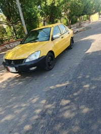 السلام وعليكم شباب لانسر لببيع موديل 2009كير مكينه كفاله تخم تاير وصدر...
