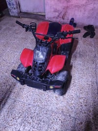 دراجه رباعيه للبيع بغداد السعر 300 07749661412