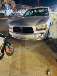 جارجر موديل 2008 كفاله عامه من الحادث وتبديل بس دعاميه اماميه مصبوغه و...