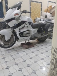 دراجه للبيع BMW موديل ٢٠٠٤ عل وضع شركه مناقصه شي محرك ٨٥٠ c أوراق كامل...