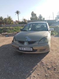 لانسر • ٢٠٠٤ • ماكينة جديدة