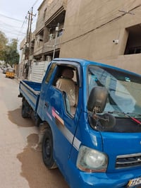 كيه ام عيون رقم بغداد موديل 2001مشروع وطني بسمنه رقم انكليزي سنويه صاق...