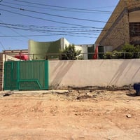 الضباط الديوانية • ٣٠٠م • واجهة ١٢ ونص