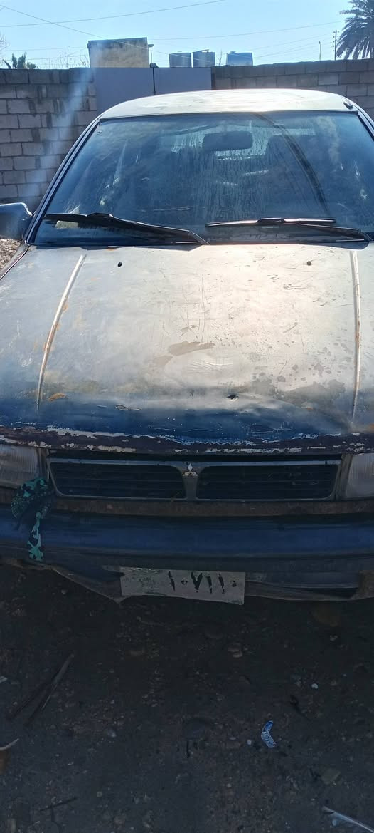 مسبوشي لنسر موديل 1991شرط مكينه وكير شرط التحويل السعر 9قفل ***********مكانه السياره موصل النمرود
