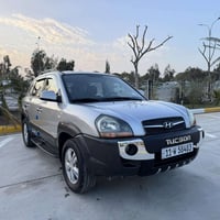 توسان • ٢٠٠٩ • مكينه ٢٠٠٠