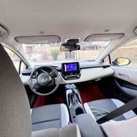 للبيع تيوتا كورلا ٢٤هايبرد محسن  اوتو هولد سايد بريك بصمه رادادت ب الم...