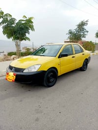 لانسر ٢٠١٠ • فتيس عادي • مكيف