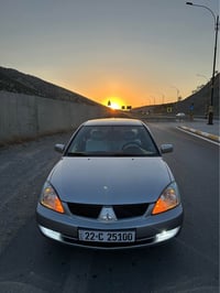 لانسر 2009 • ٢٥٠٠٠٠ كم • اربيل