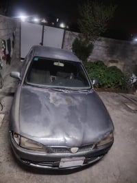 بروتون 2002  بغداد بسمي تحويل ثاني  كير محرك  قطع مال شركة   سيارة حلو...