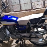 دراجه للبيع جني محرك 200 400 وبيها مجال 07728403675