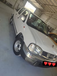 نيسان 2014سياره مكفوله رقم مثنئ بسمي 07837045378
