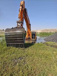 حفاره دوسان موديل 2006 حجم 420 رقم شرط مكفوله كفاله عامه 07517013303