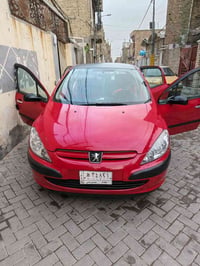 بيجو 307 • احمر • جير اوتو