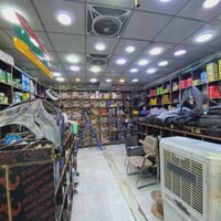 رفوف محل كامل للبيع 600الف بيهم مجال اتصال عاالرقم07724262171