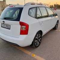 كيا كارنز ٢٠١٢ (بيع فقط) رقم بغداد الدولي تحويل مباشر  سيارة نضيفة كشن...