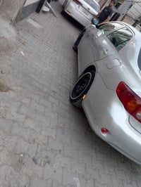 كورلا وارد امريكي 2009 باسمي بيها  رقم بغداد 07705956360