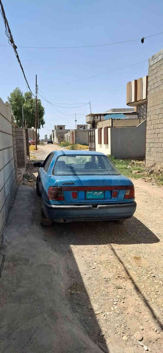 هيونداي النترا موديل 1992 محرك كير شرط  لا صرف ولا نفخ كاملة كاملة السيارة وين ما تريد تمشيك ضرر ما بيها بس دوائر بيها ضربة بسيطة بالجاملغ الخلفي بسيطة مثل ما موضح بالصورة 
 كوبون بيها جديد مو القديم جامات كهرب شغالة كلها طخم تايرات جديد غير الي بالتصوير وباتري هم جديد
ملاحظة صبغ السيارة كله بلادي عدا الجاملغات والبوند باقي الصبغ كلو بلادي
السيارة بالتصوير تبين ما مرتبة لان ما نظيفة إذا تنغسل تصير احلى من الصور
***********
