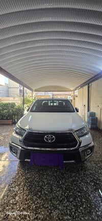 هايلوكس 23 مكينة 4 سلندر 2700 ماشية 38 رقم اربيل بإسم شركة تحويل او وك...