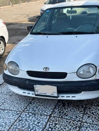 كورلا 1999 رقم بغداد مشروع وطني بسمي مصبوغه حزام السعر 60 وبيها مجال ل...