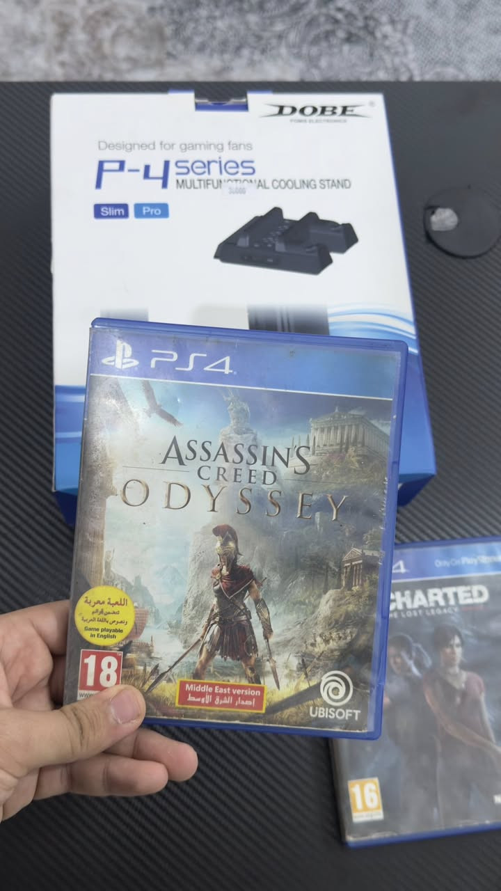 السلام عليكم شباب، متوفر عندي مجموعة ألعاب بلايستيشن 4 (PS4) أصلية ونظيفة جداً وبحالة ممتازة (شغالين 100%)، بالإضافة إلى قاعدة تبريد وشحن للملحقات.

🎮 قائمة الألعاب المتوفرة (سعر القرص الواحد: 15 ألف دينار):
1 Battlefield 1
2 Assassin's Creed Odyssey (نسخة تدعم اللغة العربية)
3 Uncharted: The Lost Legacy
4 Mortal Kombat XL

🔌 ملحق إضافي للبيع:
 قاعدة تبريد وشحن للمصنع DOBE (P-4 Series): متوافقة مع جهاز PS4 Slim و PS4 Pro. القاعدة ممتازة لتبريد الجهاز وشحن للجويستك استخدام يوم واحد فقط 

📍 تفاصيل إضافية:
 الموقع: [كربلاء ملحق الفارس]
 التوصيل: (ماعندي توصيل تجي للبيت تاخذهم) 
 للتواصل:واتساب ***********
