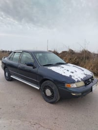 سياره سيفيا للبيع موديل ٩٦رقم ديالى مشروع وطني سنويه جديده ل٢٠٣١مكفوله...