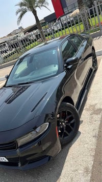 دوج جارجر 2017 لون أسود بدون صبغ  تبديل قطعتين نفس اللون بنيد و باب فق...