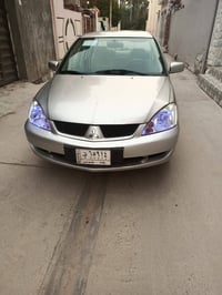 لانسر • ٢٠١١ • رقم بغداد