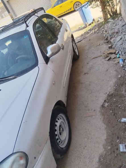 اقرة التفاصيل كلشي ببالك تلكا مكتوب للبيع او مراوس بهاج باك
دايو لانوس 2000
السيارة مغلقه ارضية وبوب و سقف وصندوق عازل حرارة وصوت 
 محرك مفتوح كير عادي

كير اوبترا جديد + مكينه انطيك شرط بيها

4 لويات تخم جدد حتى بعدهن مطابعات + 4 دبلات

جام 4 كهربائي + بطاين بوب مال لانوس حديث

مكفولة من الصبغ و الضربه

سستم سماعات 🔇 مال ازيرا 4 و مسجل يتحمل دمام ماركة كينود

تبريد ويا السويج

 ولف حماوة جديد

تخم تاير جديد

مجول + واير بلك و بلكات بشرط بعدهن بالكارتون كله الماني

تخم نوزلات و فيت بام 

باتري 74 امبير جديد

سنوية لل 2027 رقم بغداد اوربي

ماصدات و بكلايتات جدد

حساسات كلها جديدة

نقصها حساس صالنصة صار يومين يخربط فقط حسب ما طلعلي بالجهاز

السعر 41 و بيها مجال

عنزاني بغداد الدورة *********** متاح واتس
