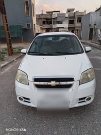 سيارة افيو 2010للبيع اعلى فئة بالافيو جامات كهرب ضرر قطعة واحدة مرايات...