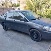 لانسر ٢٠١٠ • مكينة ٢٠٠٠ • ضربة جنطة