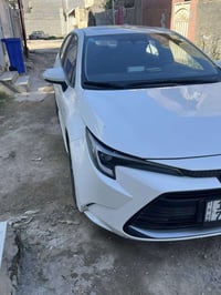 كورلا  2025 للبيع  ماشيه 21  مكان السياره بغداد /الجزيره السياحيه  الس...