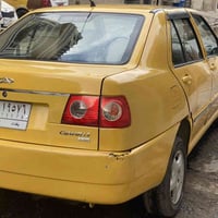 شيري كوين 2010 الون برتقالي مصفر السياره كامله من حداديه صدر جديد دبلا...