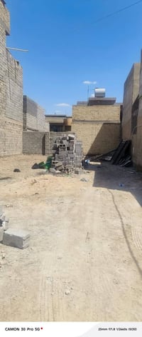 قطعه ارض 200م مع التشجير  حي البساتين حي السلام  مقابل الضباط قرب المخ...