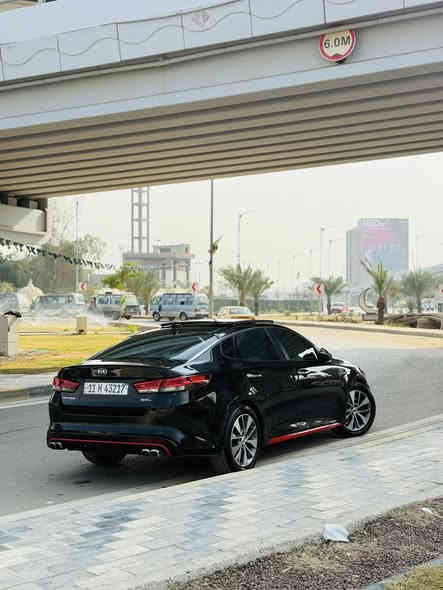 كيا أوبتيما 2016 SXL تيربو 🚀 فول مواصفات
المحرك:
 • 2000 تيربو
 • دبل كزوز
 • 3 طكات بانوراما

الكاميرات والحساسات:
 • 5 رادارات (أمامي + خلفي بالدعاميات)
 • 5 كاميرات شاملة
 • كاميرات جانبية بالمرايات
 • كاميرا خلفية
 • كاميرا علوية بالقمارة
 • 4 كاميرات 360°
 • حساسات أمامية + خلفية
 • بصمة حساسات خلفية
 • نقطة عمياء

 • تبريد قطعتين منفصل
 • كشنات جلد
 • داخلية قرميدي
 • كشنات كهرباء + تبريد + تدفئة + مساج
 • كشنات خزن (ميموري) 3 وضعيات
 • أوتو هولد
 • 3 وضعيات قيادة
 • بردات خلفية
 • دخول ذكي
 • بصمة أبواب
 • مرايات كهرباء شفط
 • جنطة ذكية تنفتح عن بُعد
 • الجام ذكي حساس للطوارئ (إذا شي قدام ينزل تلقائي)

الصوت والإضاءة:
 • سماعات Harman Kardon عدد 10 + 2 دمام أمامي وخلفي
 • لايت LED Dynamic دوّار مع الستيرن

الإطارات:
 • ويل 19 بلادي كروم

السلامة:
 • تحديد مسار
 • توقف تلقائي
 • مثبت سرعة ذكي مع رادار
 • شاشة أعطال
 • حساس ماء الزجاج

المسافة المقطوعة: 80,000 كم

⸻

الحالة:
 • صبغ: جاملغ + بنيد + جاملغ ثاني فقط رش
 • بدون دواخل
 • شواصي ولغود سليمة 100%

⸻

السعر: 120$ – وبيهه مجال بسيط

📞 ***********
📍 الموقع: الدورة
