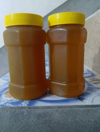 عسل طبيعي • درجه اولى • مال بيت