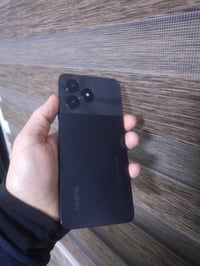 ريلمي نوت 50 • ٦٤ • لاقطة اتصال