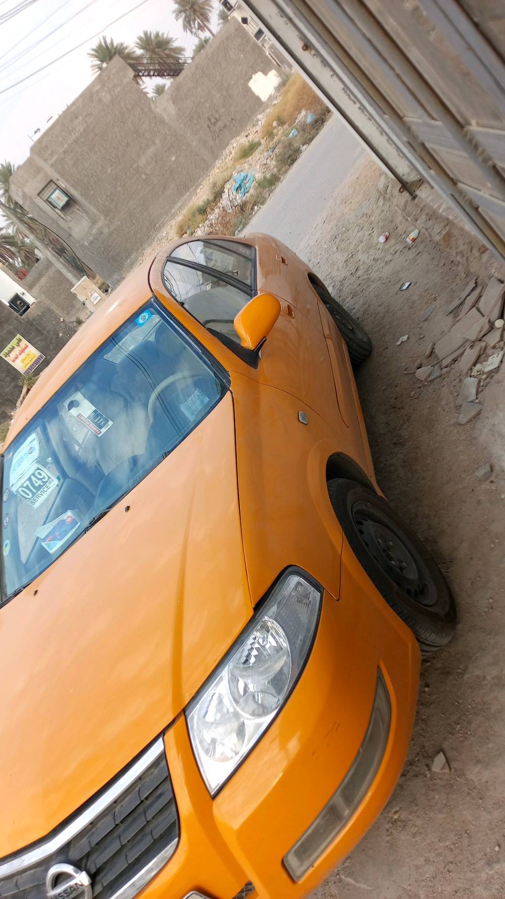 سني سامسونج موديل 2009 رقم بغداد الإنكليزي سيارة بسمي هيئة وغرامات مصفرة بيها ضربه في بركيت موصله صندوق ولا جاملغات وطخه في جاملغ الامامي 