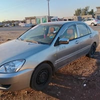 لانسر موديل ٢٠١٠ رقم  ديالى  سياره خير من الله بيع مستعجل سعر75 ورقه و...