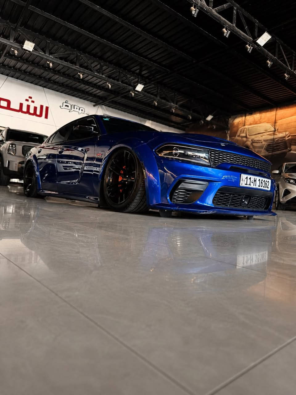 🦅 للبيع — جارجر SRT سكات باك وايد بدي اصل شنو البالك بيها
▫️ الموديل : 2021 
▫️ ماشية : 26 ألف فقط  
▫️ المحرك : SRT 6.4L V8  
▫️ القوة : 540 حصان    

💎 السيارة من النضيفات النادرات 
لون أزرق ملكي سيارة جديدة  بدون أي صرف.  

⚡ التزويد والأداء :  
✔️ برمجة مصطفى إيكل  🦅
✔️ شوته رياضية مفتوحةafe 6400  
✔️ بلكات ريسنك 
✔️ دركة SRT فورجد لون احمر rbm اخر صدار ابلوتوث  
✔️ دواخل كاربون فايبر  
✔️ إضاءات LED داخلية بالأبواب والديشبول بتحكم بلوتوث وتغيير ألوان  
✔️ كزوز SRT بلادي — صوت طرب الطرب صافي ونقي🔥  
عليها وسطيات سل ستيل 
🖤 المواصفات :  
✔️ فول الفول / خنك 1-1  
✔️ رادارات أمامية وخلفية وجانبية  
✔️ نقطة عمياء + نظام ترحيب  
✔️ سماعات Harman Kardon طرب نقي 🔊  
✔️ Brembo رياضية  
   🔸 أمامي 6 بستم  
   🔸 خلفي 4 بستم  
✔️ فتحة سقف (سلايد)  
✔️ مقاعد حضن كنتاره ختم النحلة  
✔️ تبريد وتدفئة للمقاعد الأمامية  
✔️ تدفئة للمقاعد الخلفية  
✔️ ميموري لحفظ وضعيات الجلوس  
✔️ تحكم كهربائي بالمقود  
✔️ تدفئة ستيرن  
✔️ كير شفتر بالستيرن  
✔️ شاشة 8.4 SRT كاملة  
✔️ ويلات 20 إنج وايد بدي  

⚠️ الملاحظة :  
حادث دعامية أمامية فقط وسعرها 330 والسيارة مرتبة جدًا.  

📞 للتواصل : ***********
