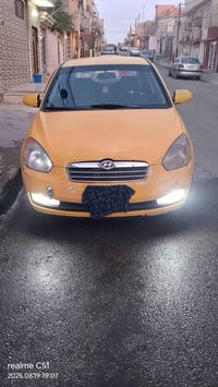 سياره اكسنت 2009 كربون بنزين بيها جامات كهرب محرك 16 جير عادي هيئه وغر...