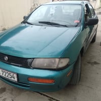 مازدا فاصوليا  موديل 1995 بدون صبغ  كير اوتوماتيك  سنوية 2030 رقم نينو...