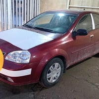 البيع اوبتره جديده 2004  رقم بغداد  07724642135