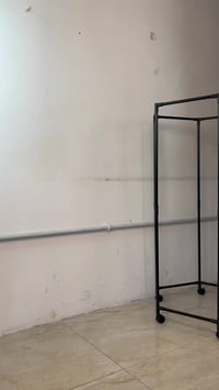 ستاند ملابس دوّار • عجلات • تحمّل ٤٠كغم